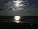 Full moon with beach fire